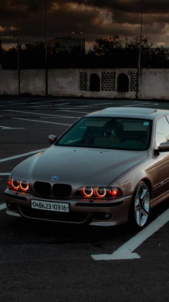 pexels photo 33424769 33424769 Stylish BMW E39 parked in an Algerian city at dusk, highlighting urban lifestyle.