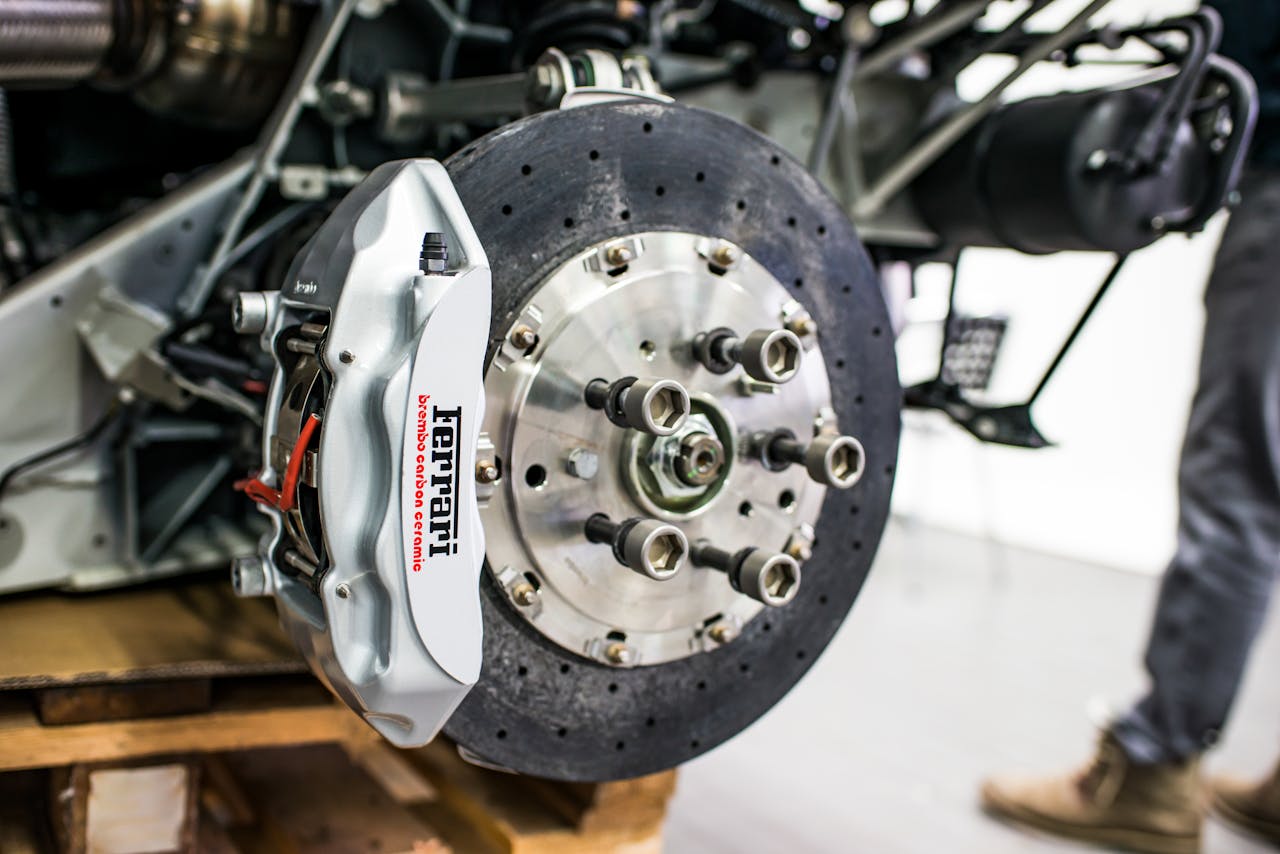 Avaleht Detailed view of disc brake and caliper on a high-performance car, emphasizing precision and technology.